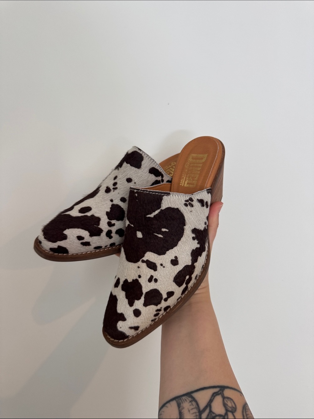dingo Cowprint Mule Clogs in Black & White